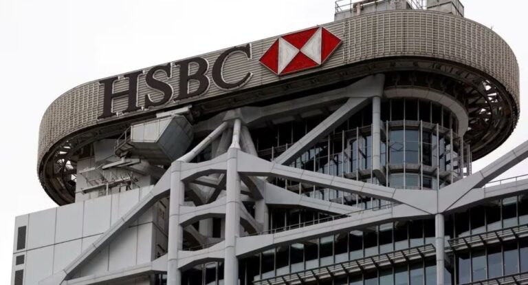 A logo of HSBC is seen on its headquarters at the financial Central district in Hong Kong, China