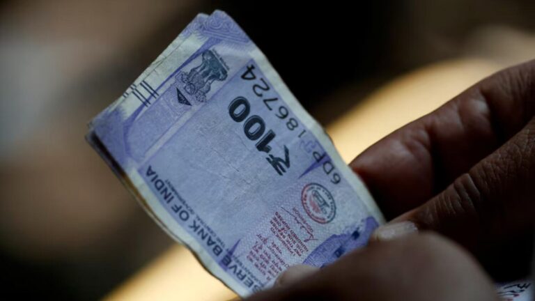 Indian rupee drops to lifetime low on outflow worries