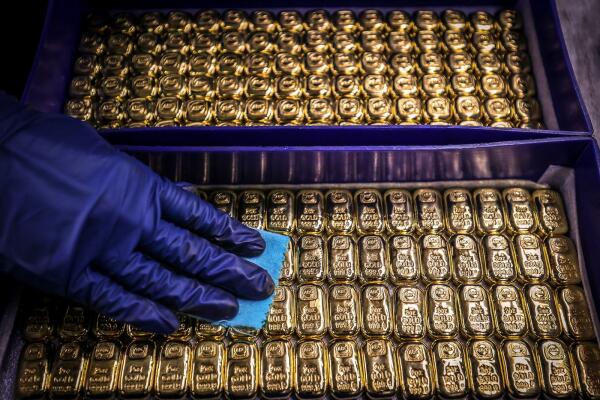 Gold prices break $2,700 level for the first time as uncertainty looms