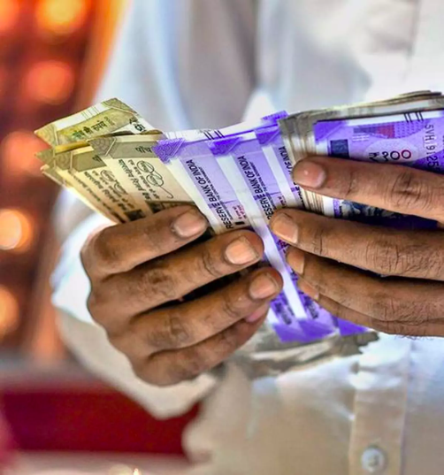 Rupee slumps 11 paise to 85.75 against dollar in early trade